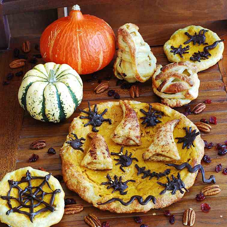 Halloween pumpkin pie with chocolate bugs