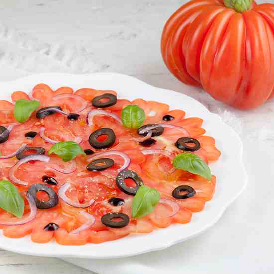 Coeur de boeuf tomato carpaccio