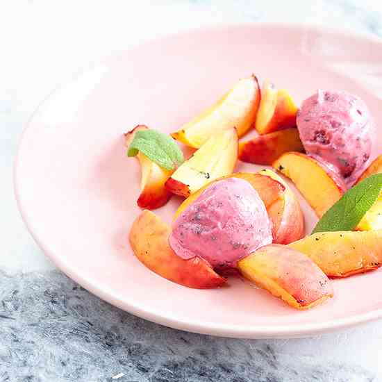 Sage ice cream with oven roasted peaches