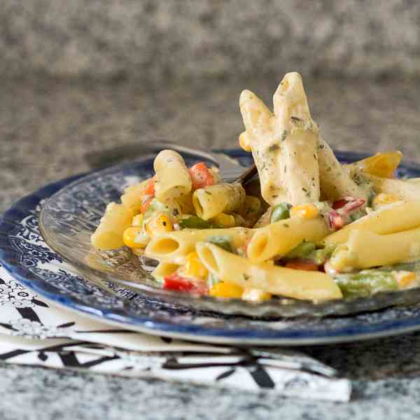 Pasta With Veggies in White Sauce