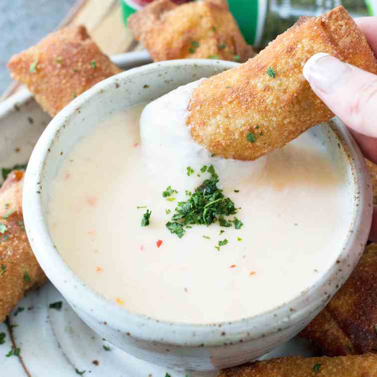 Chorizo Egg Rolls with Spicy Queso Dipping