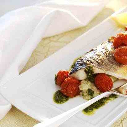Grilled fillets of sea bass with herb riso
