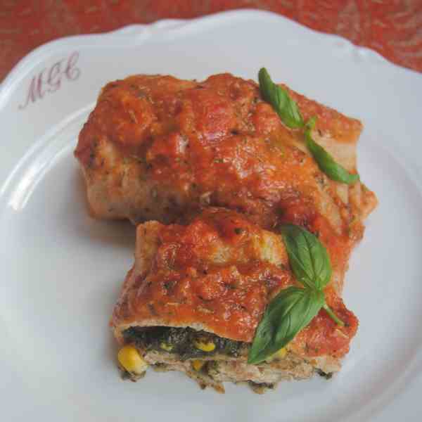 Pancake rolls with tomato sauce