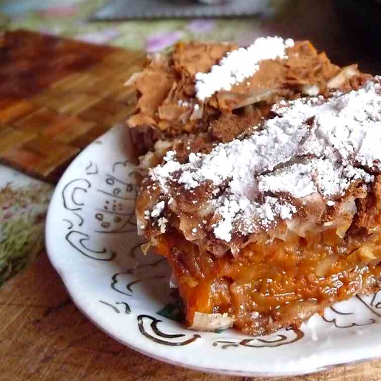 Pumpkin pie with walnuts and cinnamon