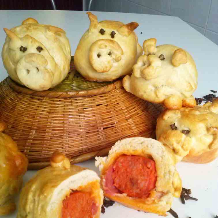 Buns with sausage, pigs