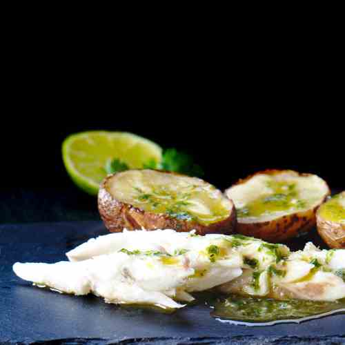 Salt sea bass with green sauce 