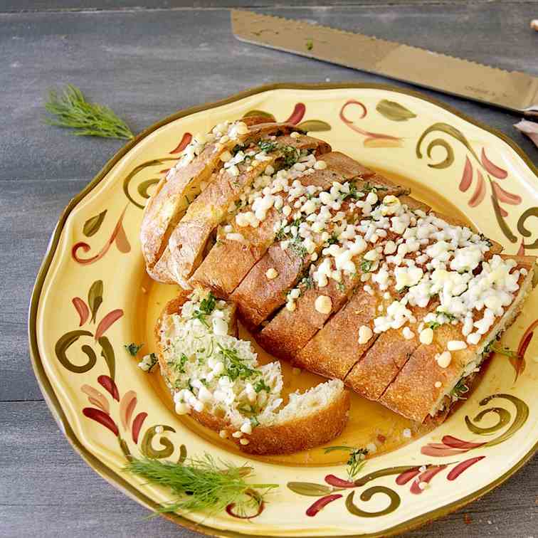 Baked bread with herb butter