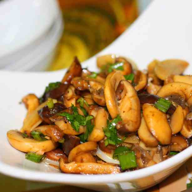 Stir fry mushroom in butter, garlic & wine