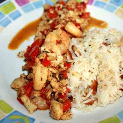 Fish-Ragout and rice with pine-nuts