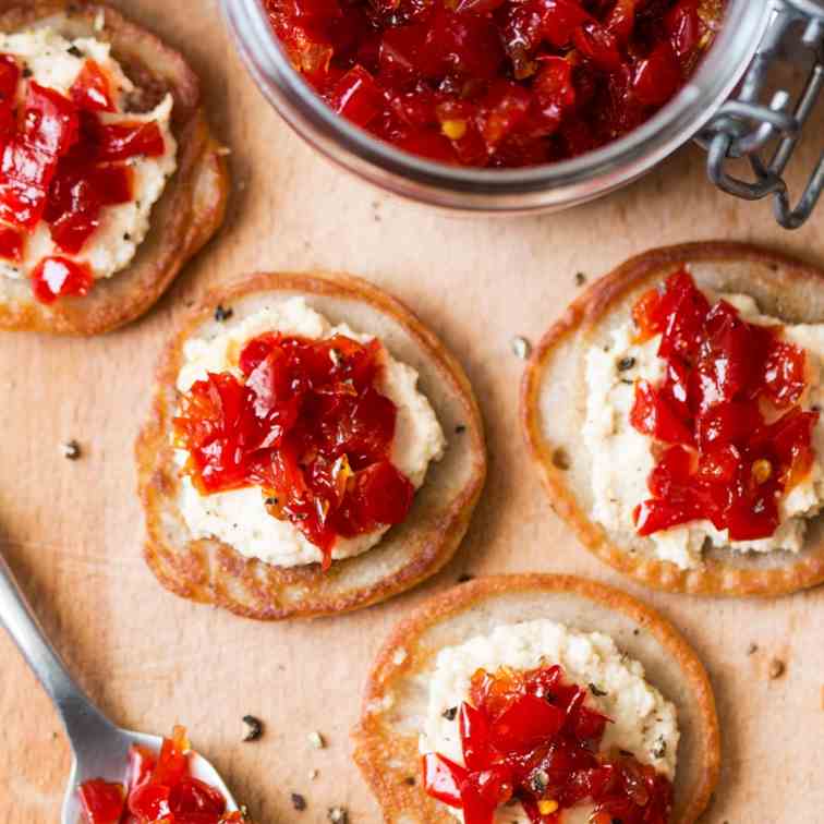 Vegan blinis with red pepper relish
