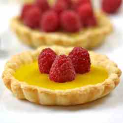 Lemon curd and raspberry tartlets