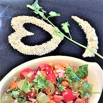 Cherry tomato and grape salad with sesame 