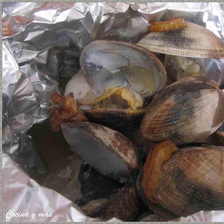 Hake with clams in papillote