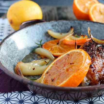 Roast guinea fowl thigh with orange, onion