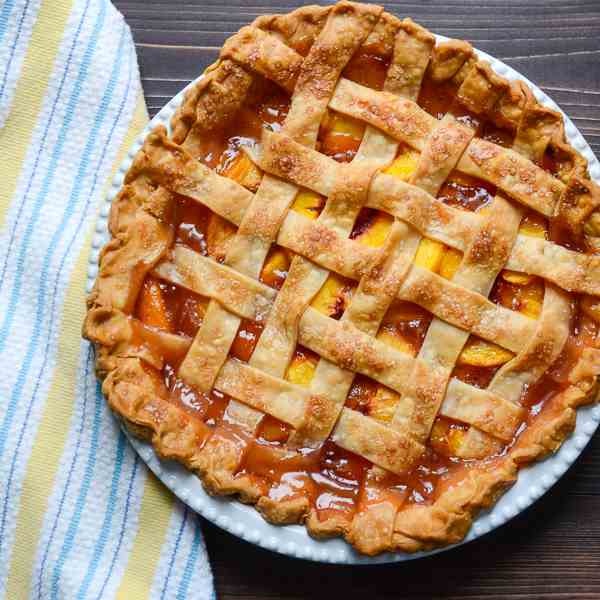 fresh peach pie with lattice crust