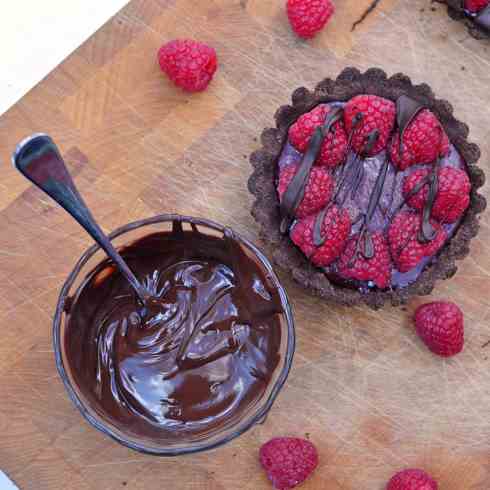 Individual choc-raspberry curd tartlets