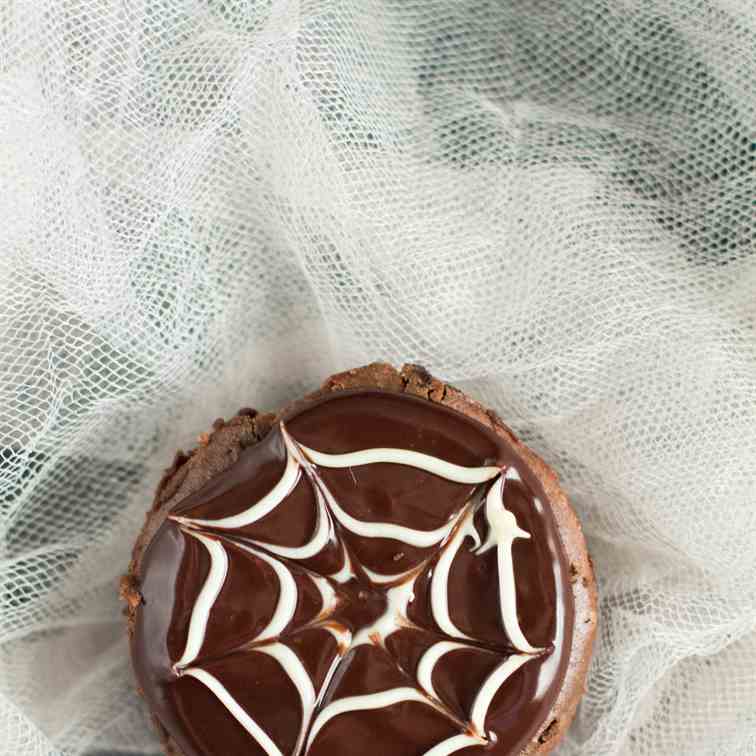 Mini Chocolate Spiderweb Cheesecakes